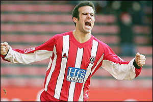 Andy Liddell celebrates scoring twice for Championship side, Sheffield United