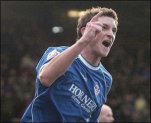 Scot Vernon celebrates finding the back of the net in the 14th minute of play