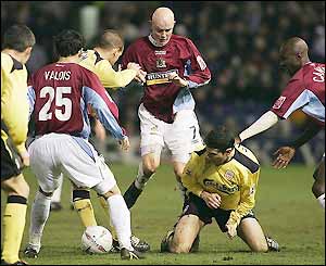Liverpool's Antonio Nunez scraps for the ball