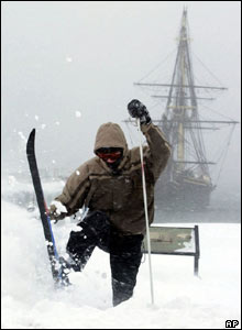 John Abell passes the schooner Friendship on cross-country skis in Salem, Massachusetts