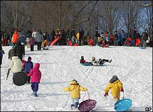People enjoy the snow in Prospect Park, in the Brooklyn borough of New York