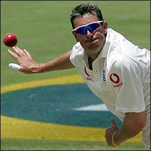England's Ashley Giles bowls a delivery