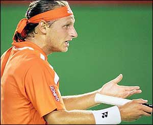Nalbandian battles himself and the crowd but gets back on level terms 