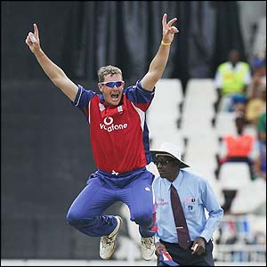 Ashley Giles of England celebrates dismissing Justin Kemp of South Africa 