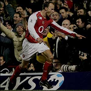 Dennis Bergkamp celebrates putting Arsenal 2-1 up