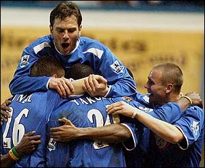 Pompey players congratluate Yakubu on his goal