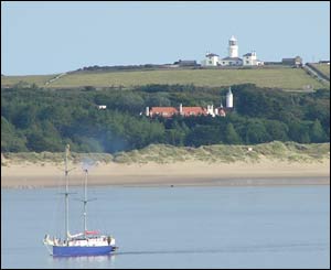 A view of Caldy Island from the promenade above North Beach, Tenby (Bryn THomas, Herefordshire)