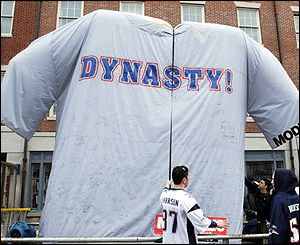 Fans sign a giant shirt proclaiming the Patriot's NFL 'dynasty' status