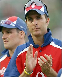 Michael Vaughan applauds the winners as a punishing tour comes to an end