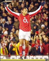 Henry celebrates another goal in front of the Highbury faithful