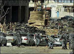 Cars crushed by the force of Monday's blast