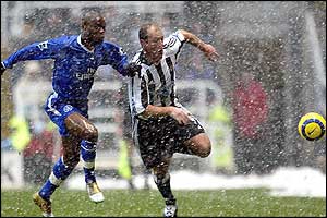 Chelsea's William Gallas races Alan Shearer of Newcastle