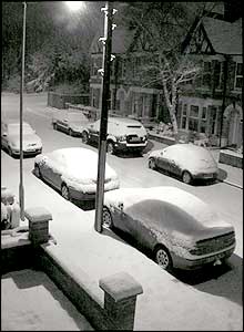 Snow-covered cars in Ashford, Kent
