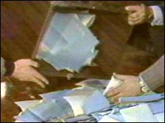 Officials empty ballot boxes in Soviet election