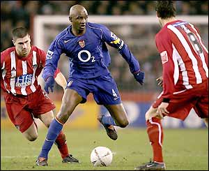 Patrick Vieira attracts the attention of Sheffield United's midfielders at Bramall Lane