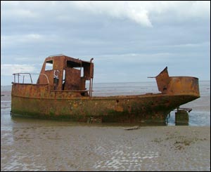 An old boat on Anglesey's Red Beach, as captured by Gareth Roberts from Bangor