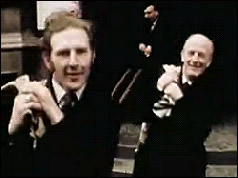 Postmen with sacks over their shoulders 