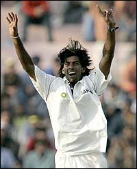 India's paceman Lakshmipathy Balaji takes his third wicket of the day