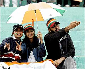 The crowd wait patiently for play to start