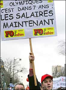 A demonstrator holds a placard during a protest in Paris, France