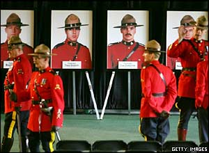 Portraits of the four killed officers