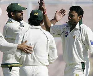 Danish Kaneria (far right) celebrates with team-mates