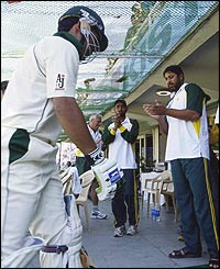 Akmal is applauded by the Pakistan team