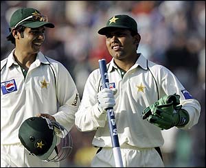 Kamran Akmal leaves the field at the end of the match