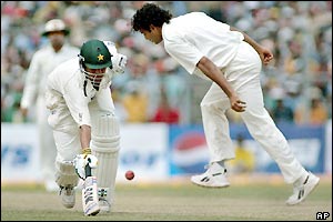 Younis Khan completes a single before Pathan can run him out