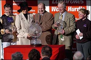 (L-R) jockey Graham Lee, owners Andrea and Graham Wylie, trainer Howard Johnson and stable lass Trisha Skidmore 