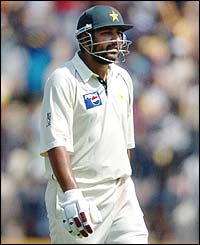 Pakistan captain Inzamam-ul-Haq walks off the field after his dismissal by Kumble