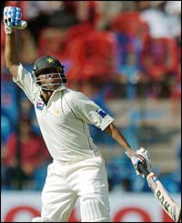 Pakistan's Younis Khan celebrates making his hundred