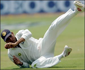 VVS Laxman spends the day trying to stop runs rather than make them