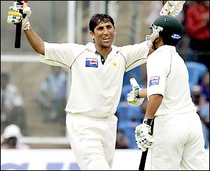 Younis Khan celebrates his double centuy with Kamran Akmal