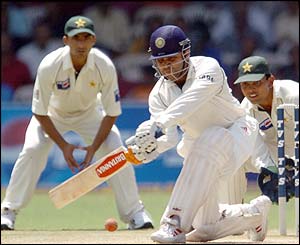 India's Virender Sehwag plays a sweep shot