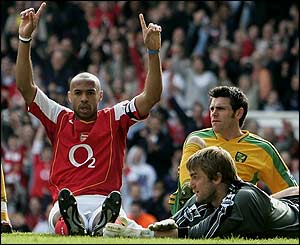 Thierry henry celebrates his hat-trick