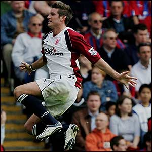 Franck Queudrue celebrates scoring