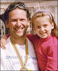 Karl Cadman celebrates with this daughter in 2003