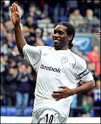 Bolton's Jay-Jay Okocha puts his side ahead with a 13th-minute penalty