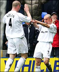 Stelios Giannakopoulos celebrates his goal with team-mate and fellow goal-scorer Kevin Nolan