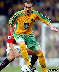 Norwich striker Dean Ashton holds up the ball