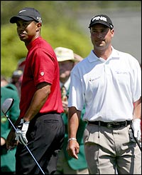 Tiger Woods (L) and Chris DiMarco (R)
