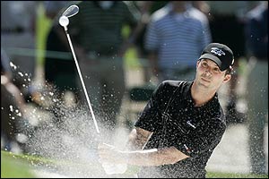Canada's Mike Weir plays out of a bunker