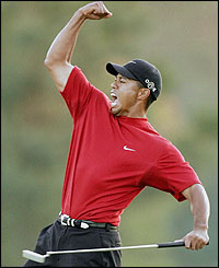 Tiger Woods celebrates his win