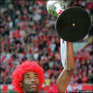 Dennis Lawrence with the trophy