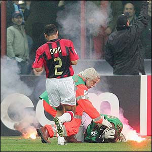 AC Milan keeper Dida is struck by a flare