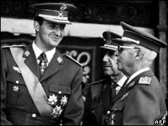 Prince Juan Carlos smiles at General Franco - 1969