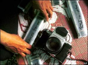 Mai Nam's negatives next to the camera he used to cover the conflict