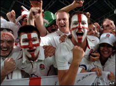 Fans with painted England faces 
