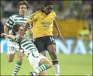 Newcastle United's Charles N'Zogbia battles with battles with Sporting Lisbon's Joao Moutinho 